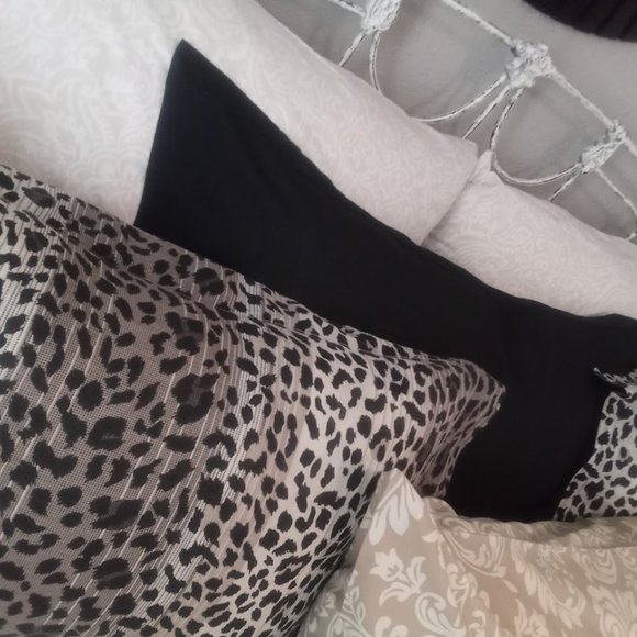 Arrangement of pillowcases in shades of cream, tan, black and browns. - Picture 4 of 4